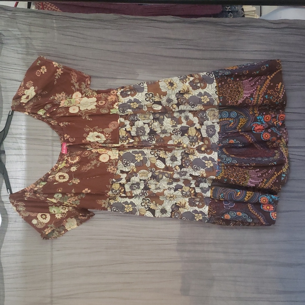 Super cute off the shoulder, tiered mini.